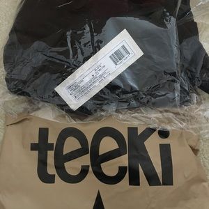 NWT Teeki solid black bell bottoms
